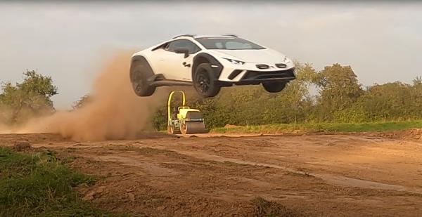 A white Lamborghini Huracan Sterrato jumping